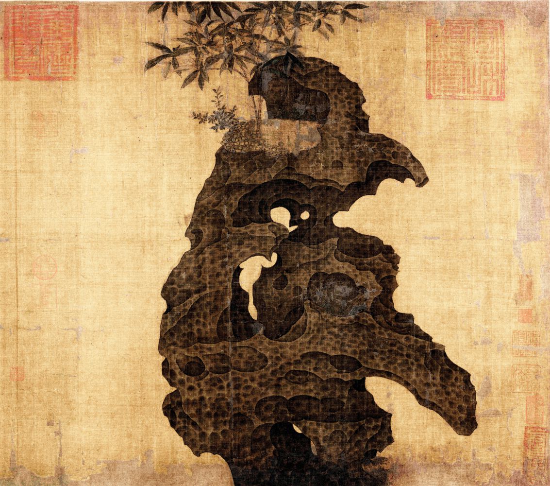 图3 宋徽宗赵佶《祥龙石图卷》局部,石顶异草右下方有瘦金体“祥龙”二字。故宫博物院藏.jpg 图3 宋徽宗赵佶《祥龙石图卷》局部,石顶异草右下方有瘦金体“祥龙”二字。故宫博物院藏.jpg
